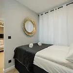 Black And Beige Apartment With Balcony And Parking In Wroclaw By Noclegi Renters