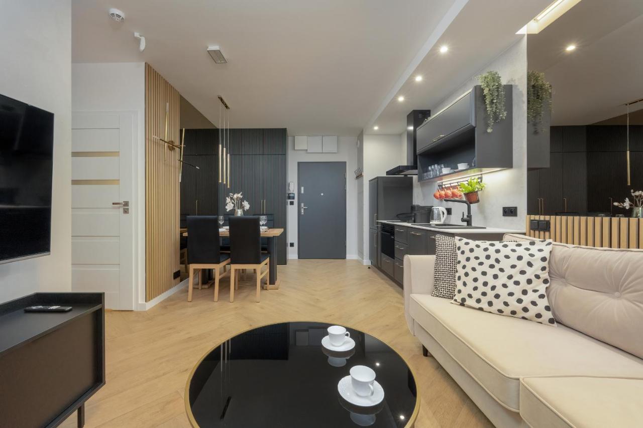 Black And Beige With Balcony And Parking In By Renters Apartament
